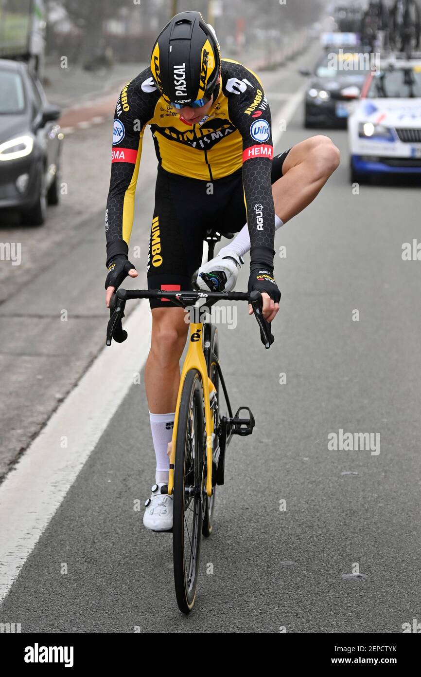 Dutch Pascal Eenkhoorn of Team JumboVisma changes a shoe during the