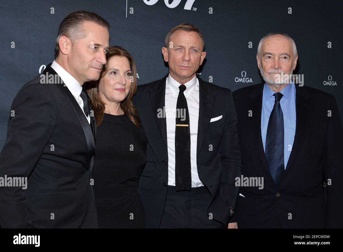L-R) Raynald Aeschlimann, President and CEO of Omega, Barbara Broccoli,  actor Daniel Craig and Producer Michael G. Wilson attend the launch of the  new “Bond” watch by Omega in cunjuction with the