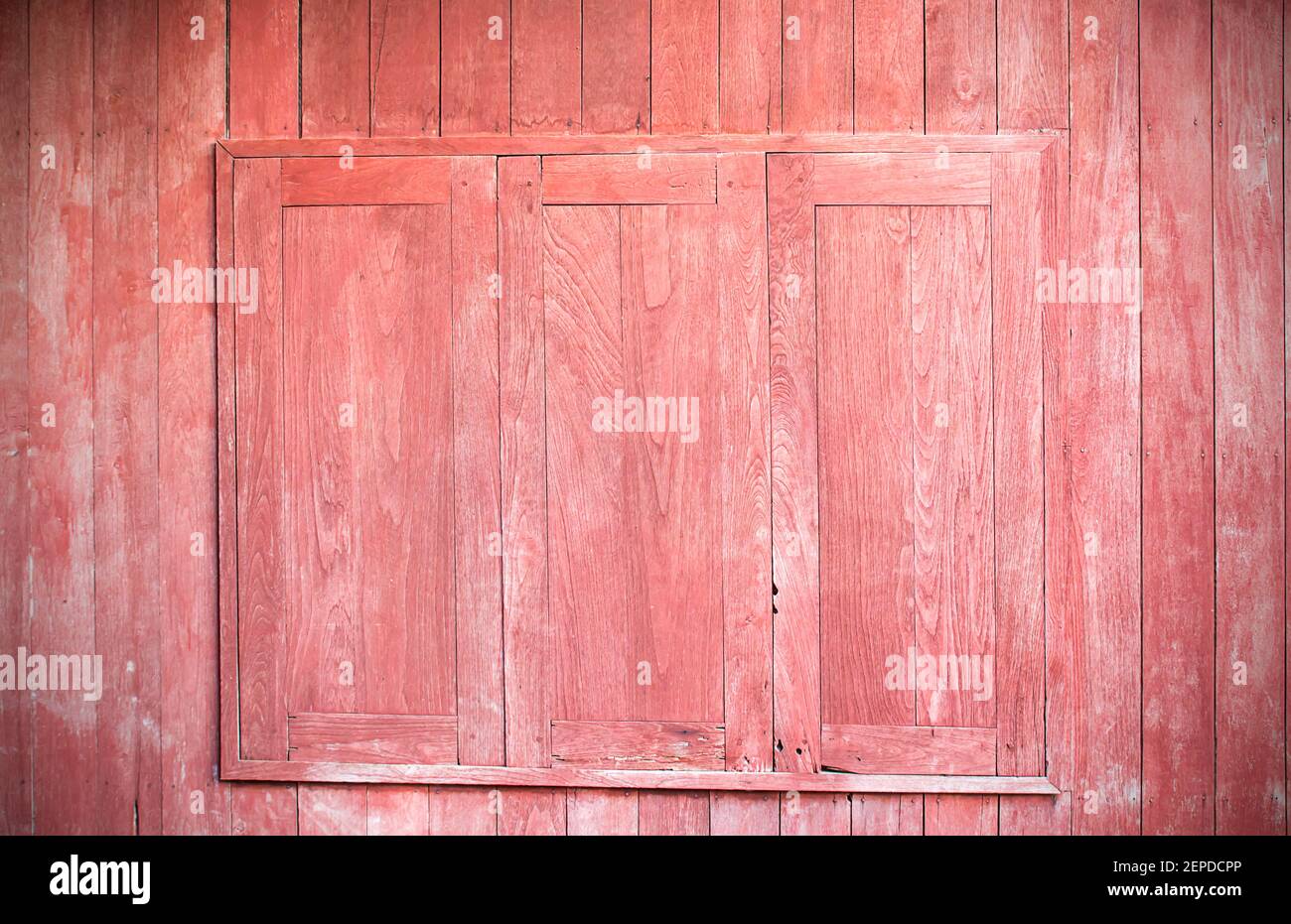 Decorative red window on an old red wood wall Stock Photo - Alamy