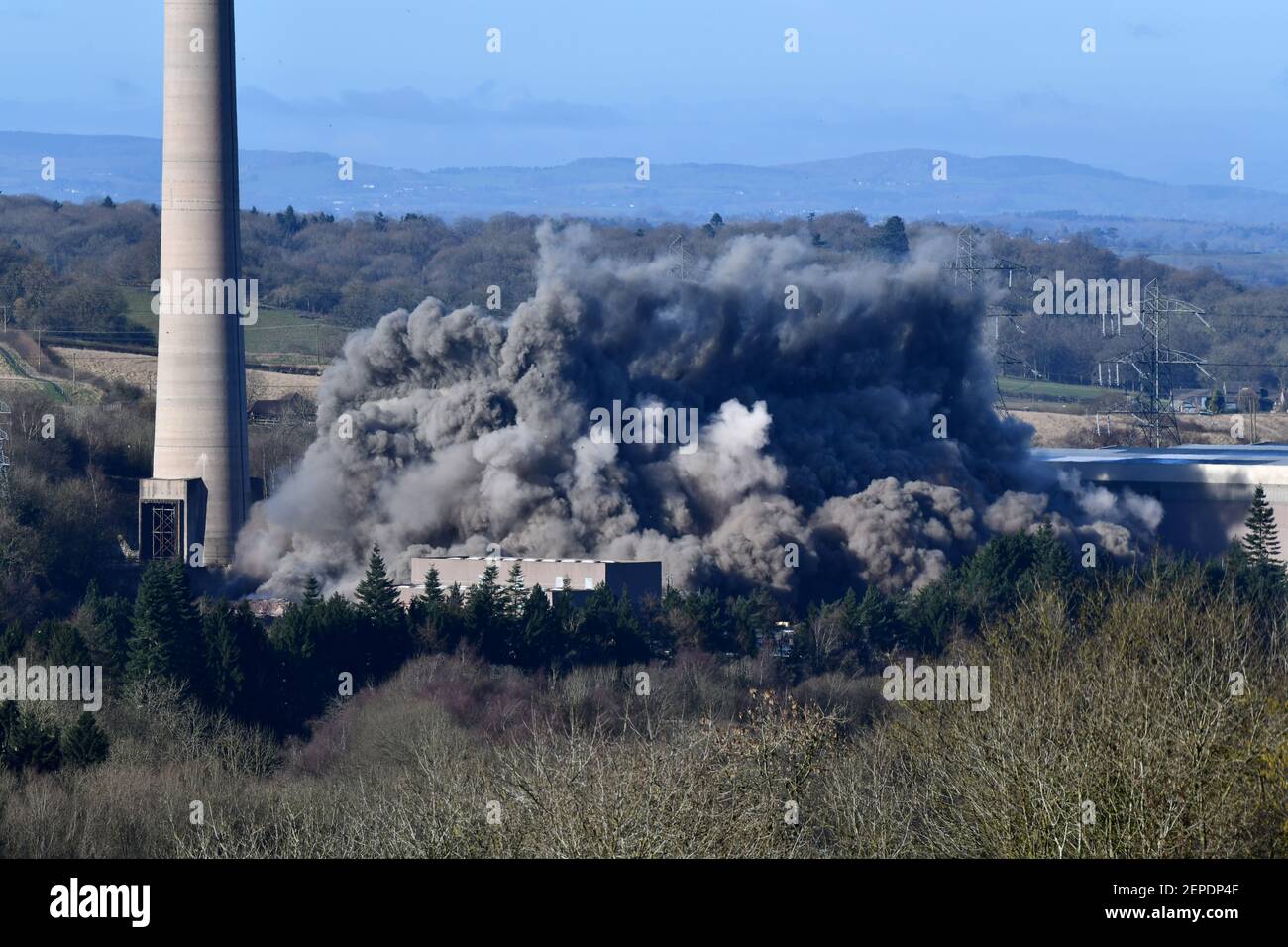 Buildwas, Shropshire, Uk. February 27th 2021 Buildwas Power Station demolished with high explosives. Another one bites the dust! The huge generating hall at Buildwas Power Station near Ironbridge in Shropshire is brought to it's knees by by demolition contractors. Credit: Dave Bagnall/Alamy Live News Stock Photo