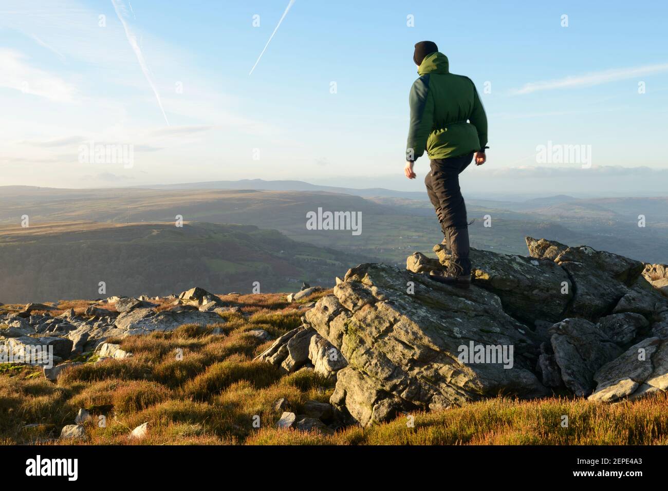 A male hiker admiring the view from Blorenge in the Brecon Beacons, Wales. Stock Photo