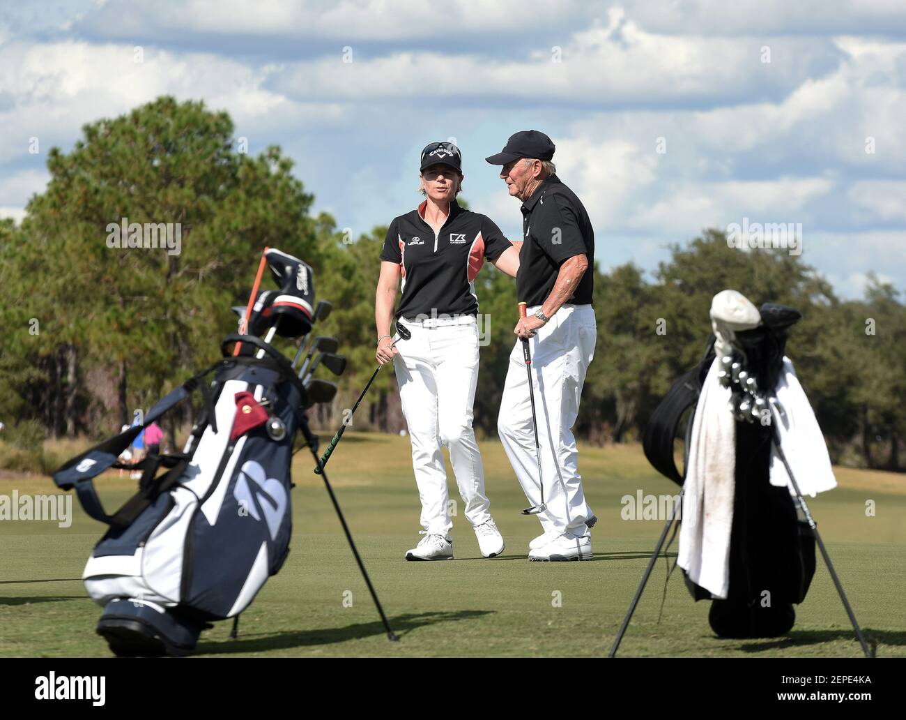 Swedish golfer Annika Sorenstam (left) embraces her father, Tom