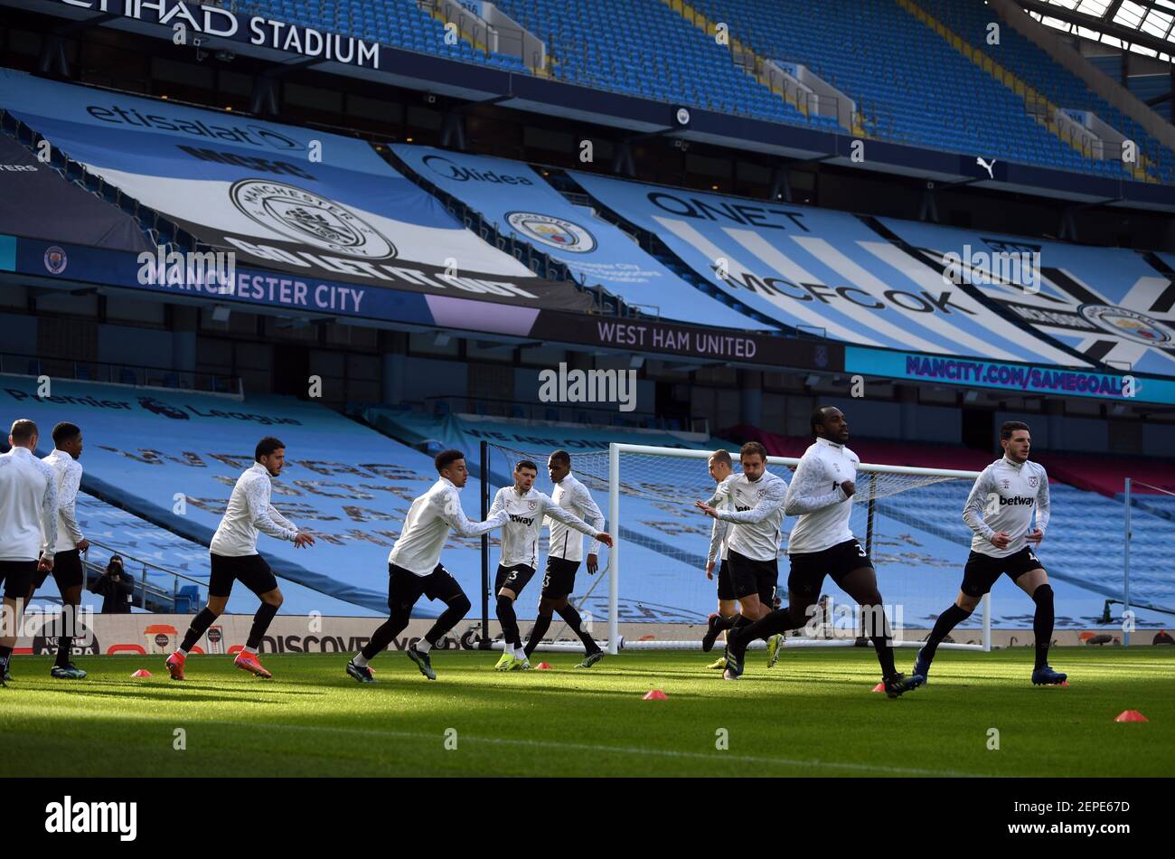 West Ham United players warm up ahead of the Premier League match at the Etihad Stadium, Manchester. Picture date: Saturday February 27, 2021. Stock Photo