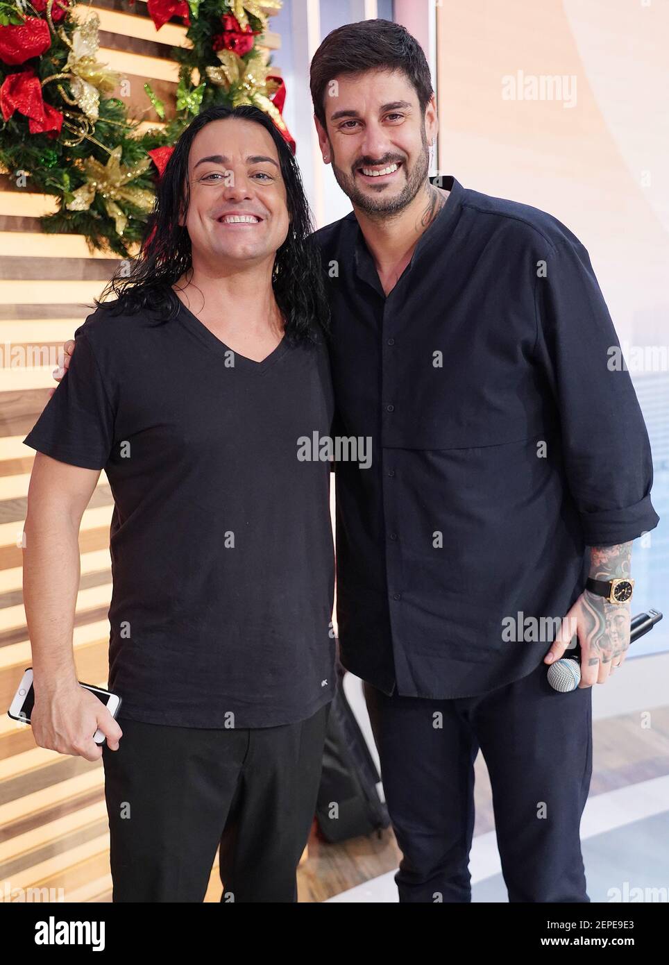 MIAMI, FL - DEC 10: spanish pop singers-songwriters Jordi Llunas and  Melendi are seen during UnivisionÕs