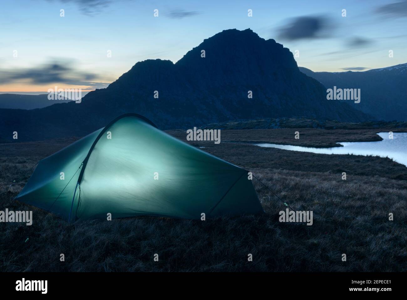 A tent pitched overlooking Tryfan, Snowdonia. Stock Photo