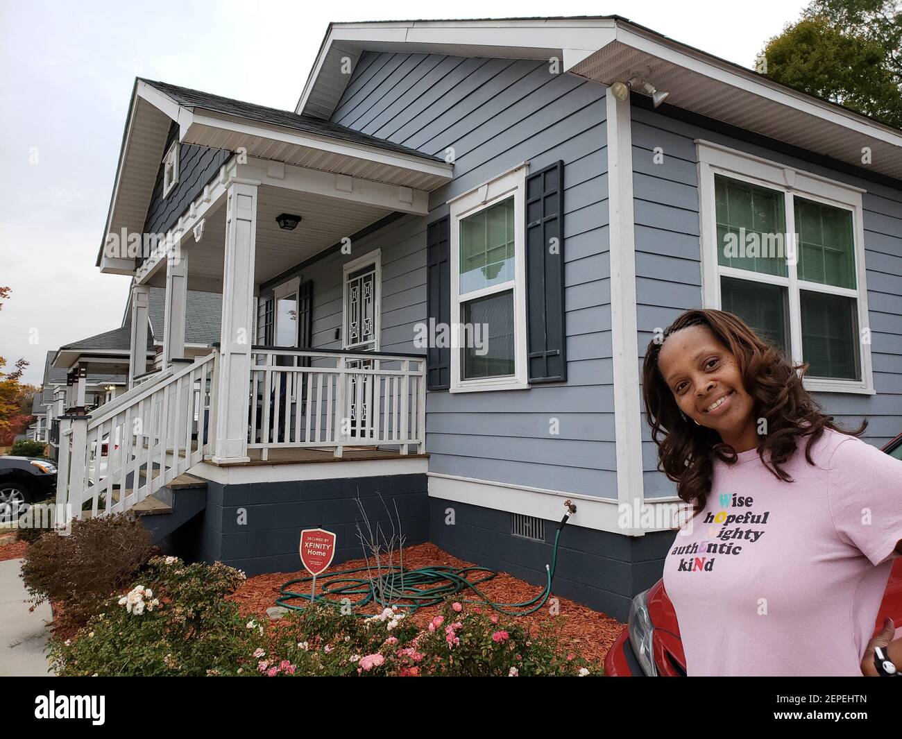 Lawanda Gibson, a childcare curriculum coordinator, became a first-time homebuyer when she moved into an Atlanta Habitat for Humanity subdivision in the city's northwest. Since then, she said, she's finished a bachelor's degree and earned a master's degree. She and neighbors look out for one another, she said. 'We all came from the same struggle.' (Matt Kempner/Atlanta Journal-Constitution/TNS/Sipa USA) Stock Photo