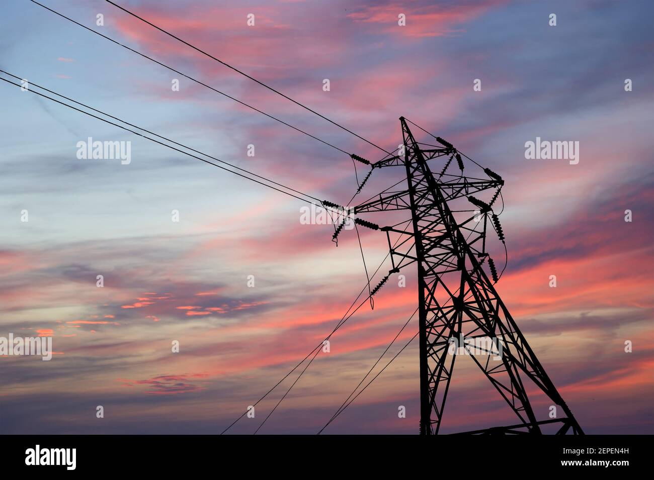 Electricity pylons and line against the blue sky and clouds Stock Photo ...