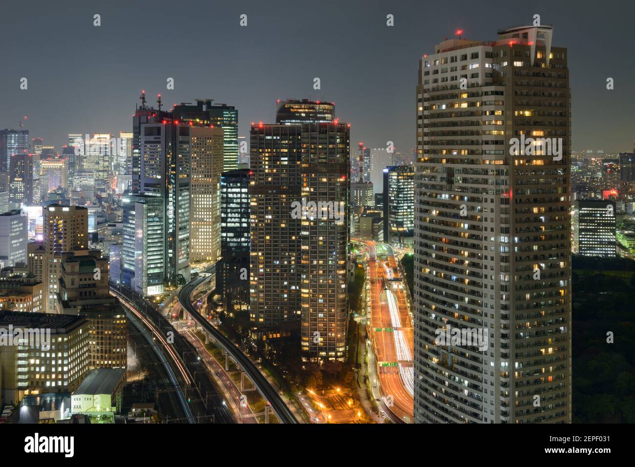 View of illuminated buildings in the Minato Ward, Tokyo, Japan. Stock Photo