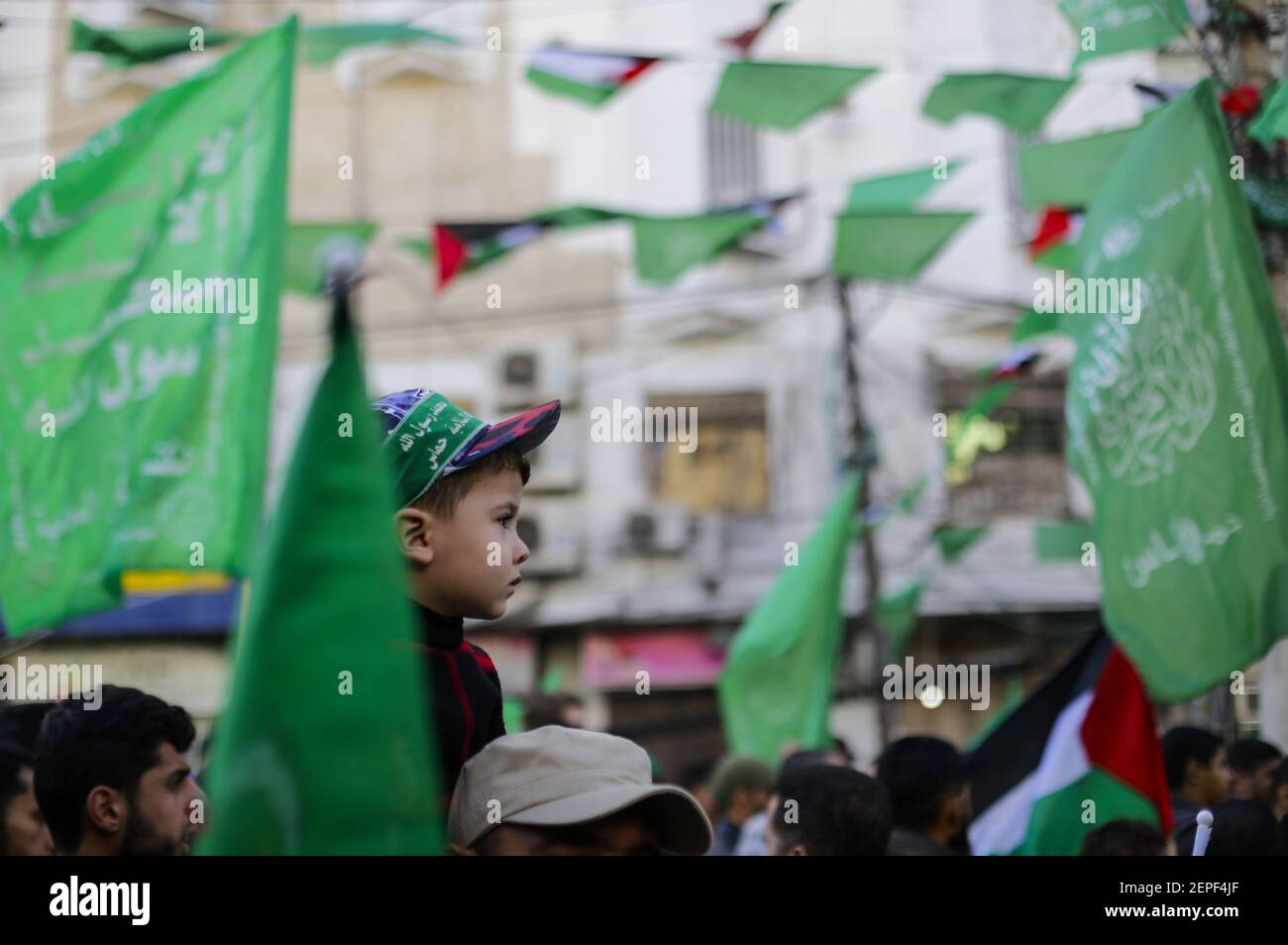 A kid with a Hamas headband during a rally marking the 32nd anniversary ...