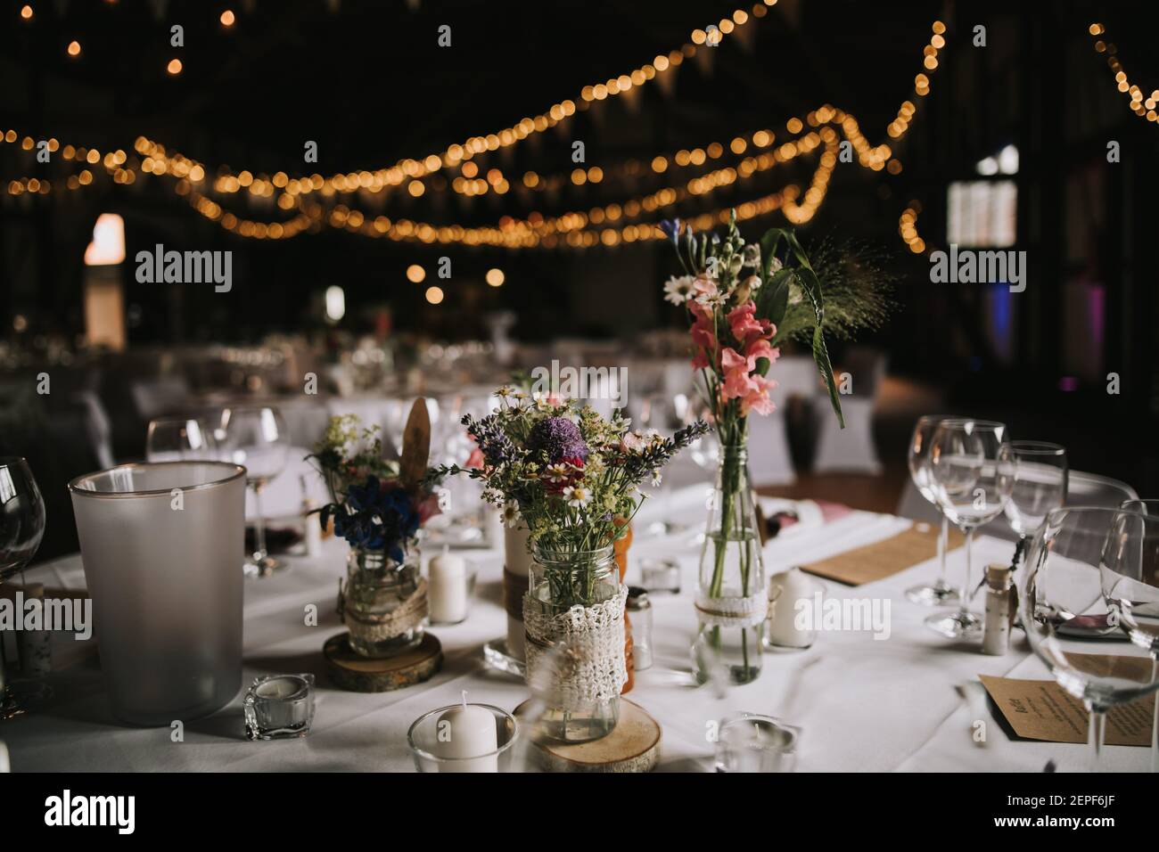 a wedding table at a restaurant in the evening Stock Photo