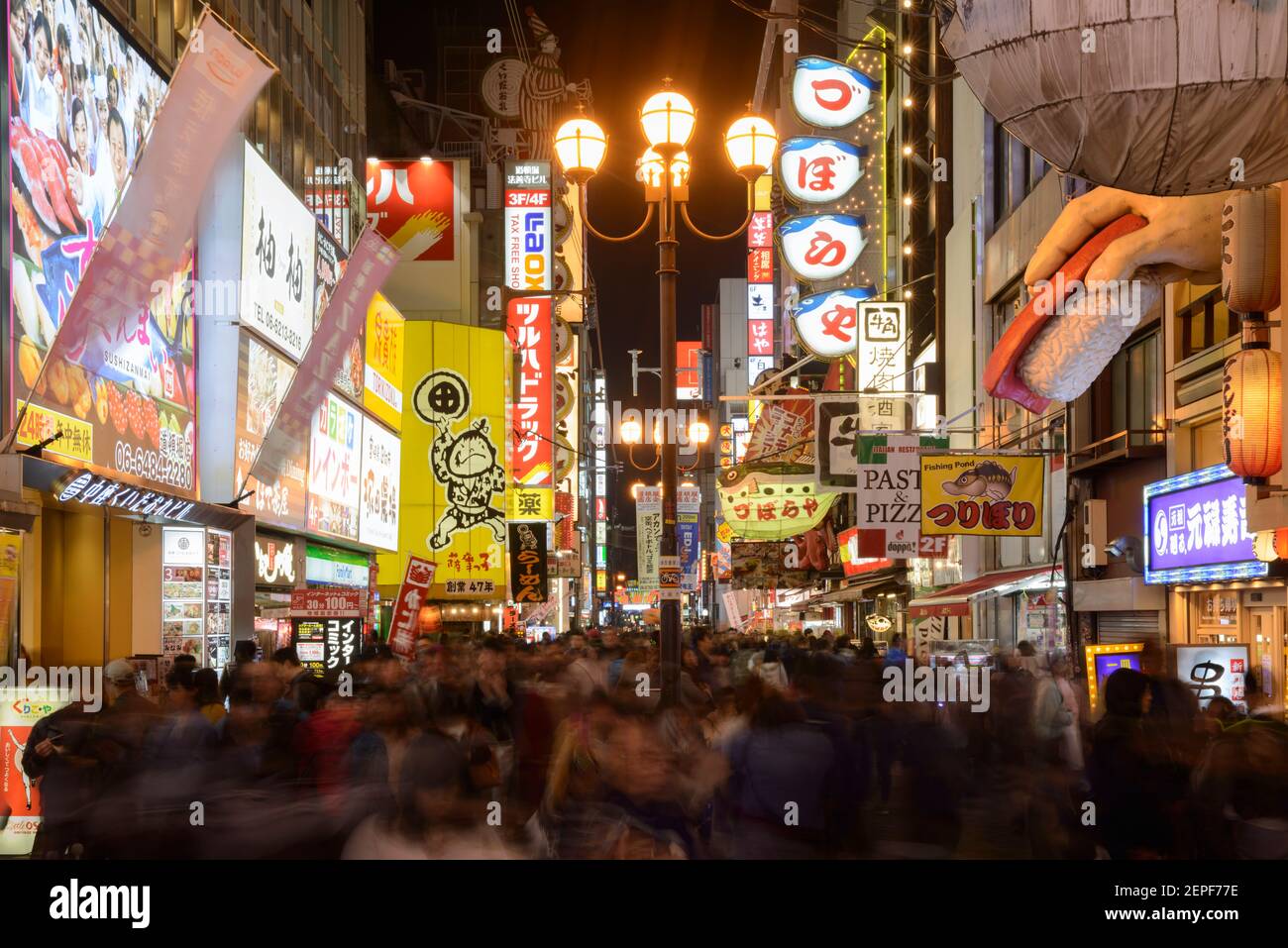 People bustling in Dotonbori, Osaka, Japan. Stock Photo