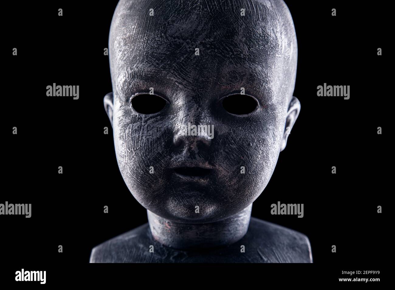 Creepy doll in the dark Stock Photo