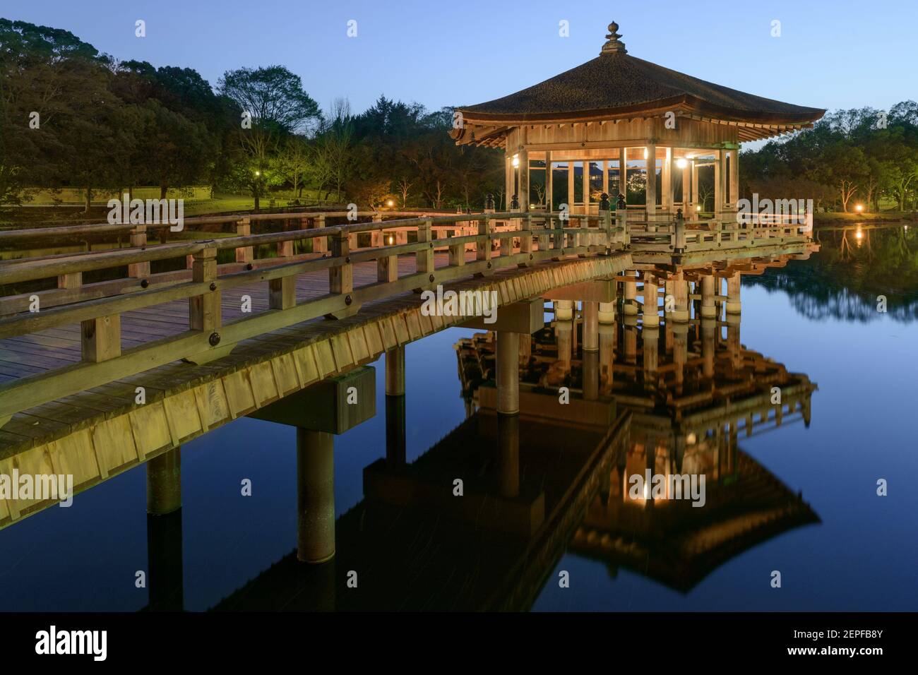 The Ukimido Pavilion Gazebo illuminated at dusk in Nara, Japan. Stock Photo