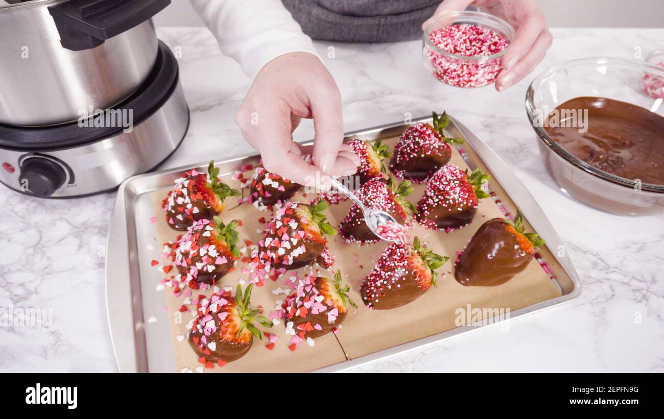 Step by step. Garnishing chocolate dipped strawberries with sprinkles
