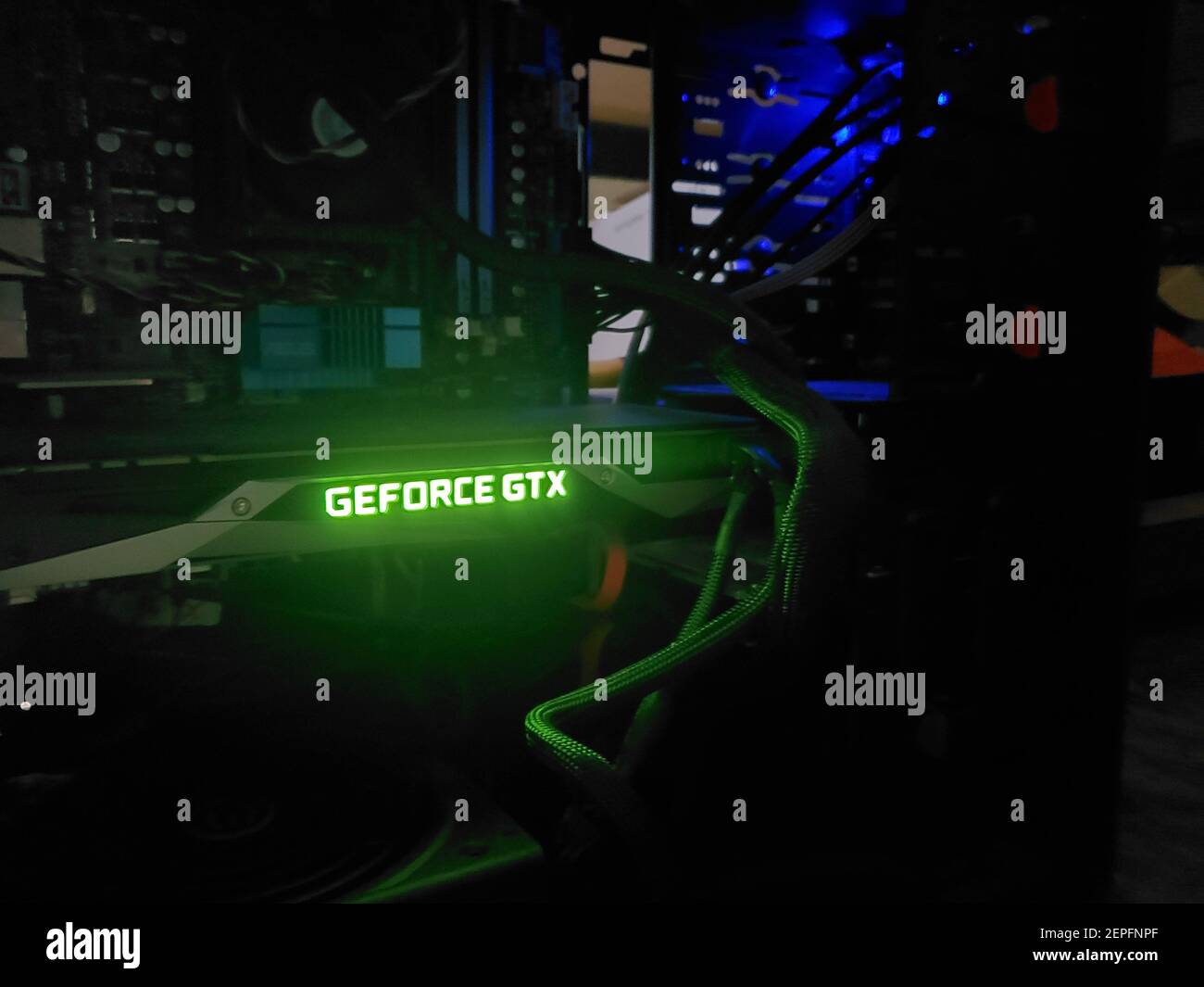 Close-up of glowing logo for an NVIDIA Geforce GTX graphics card inside a  computer in a darkened room engaging in cryptocurrency mining, including  for Bitcoin, San Ramon, California, October 23, 2019. (Photo