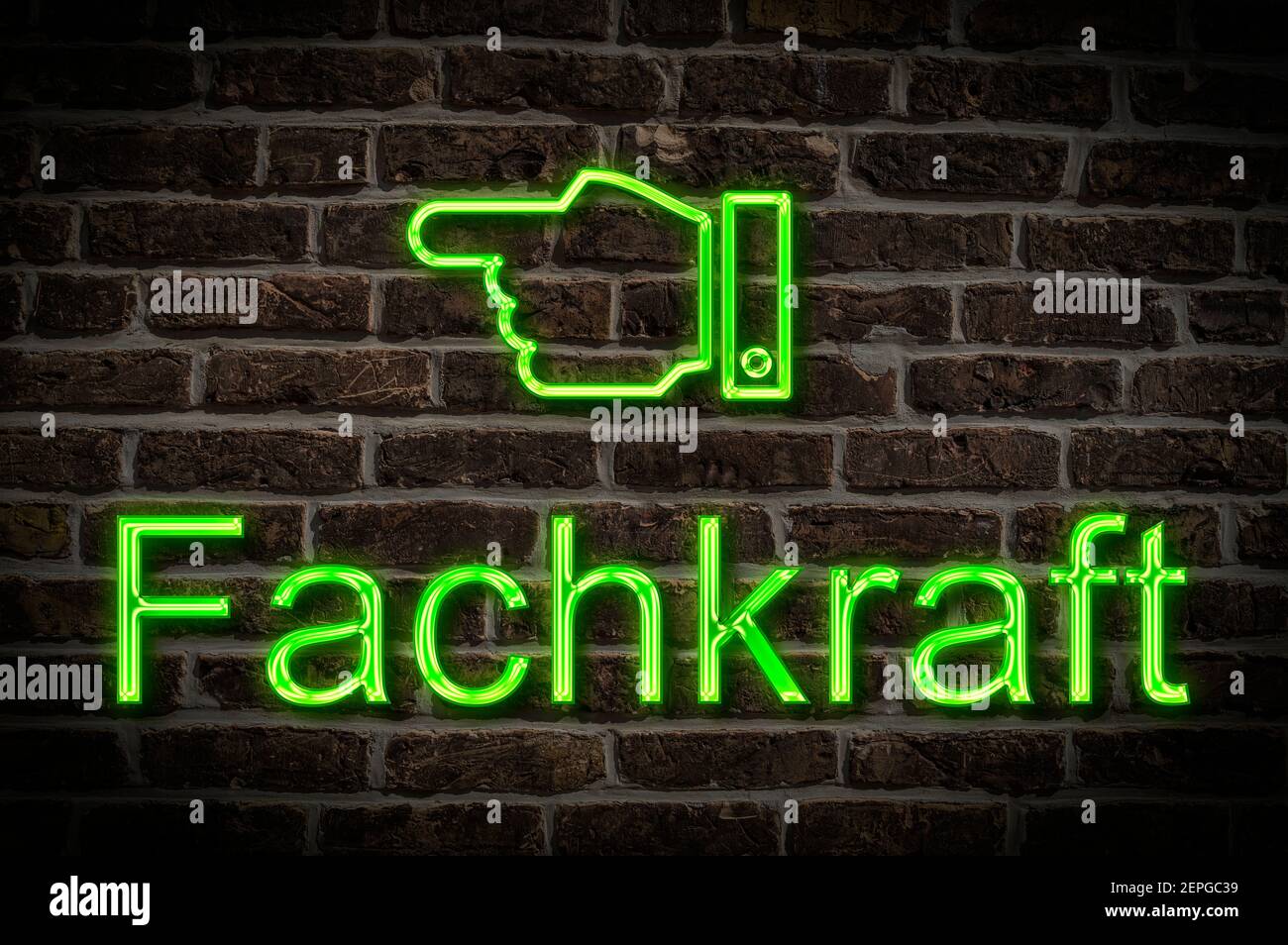 Detail photo of a a neon sign on a wall with the inscription Fachkraft (Specialist) Stock Photo