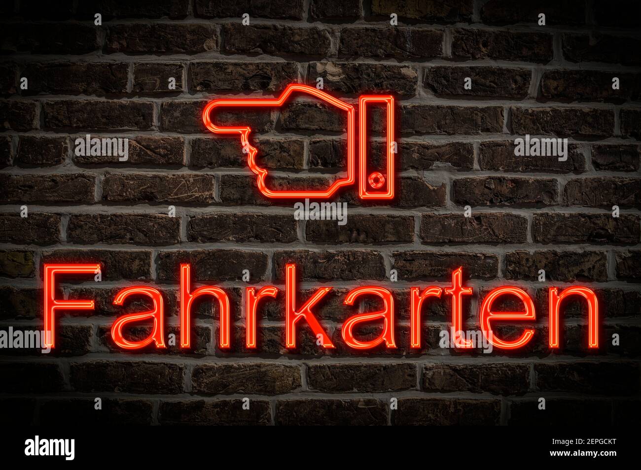 Detail photo of a a neon sign on a wall with the inscription Fahrkarten (Tickets) Stock Photo
