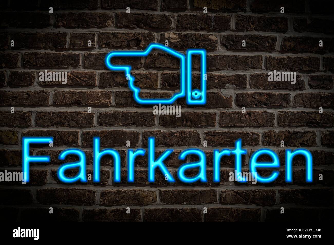 Detail photo of a a neon sign on a wall with the inscription Fahrkarten (Tickets) Stock Photo