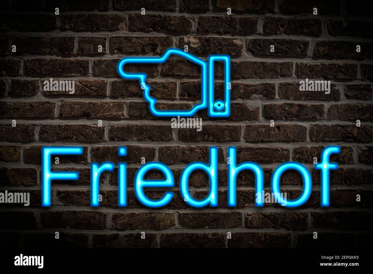 Detail photo of a a neon sign on a wall with the inscription Friedhof (Cemetery) Stock Photo