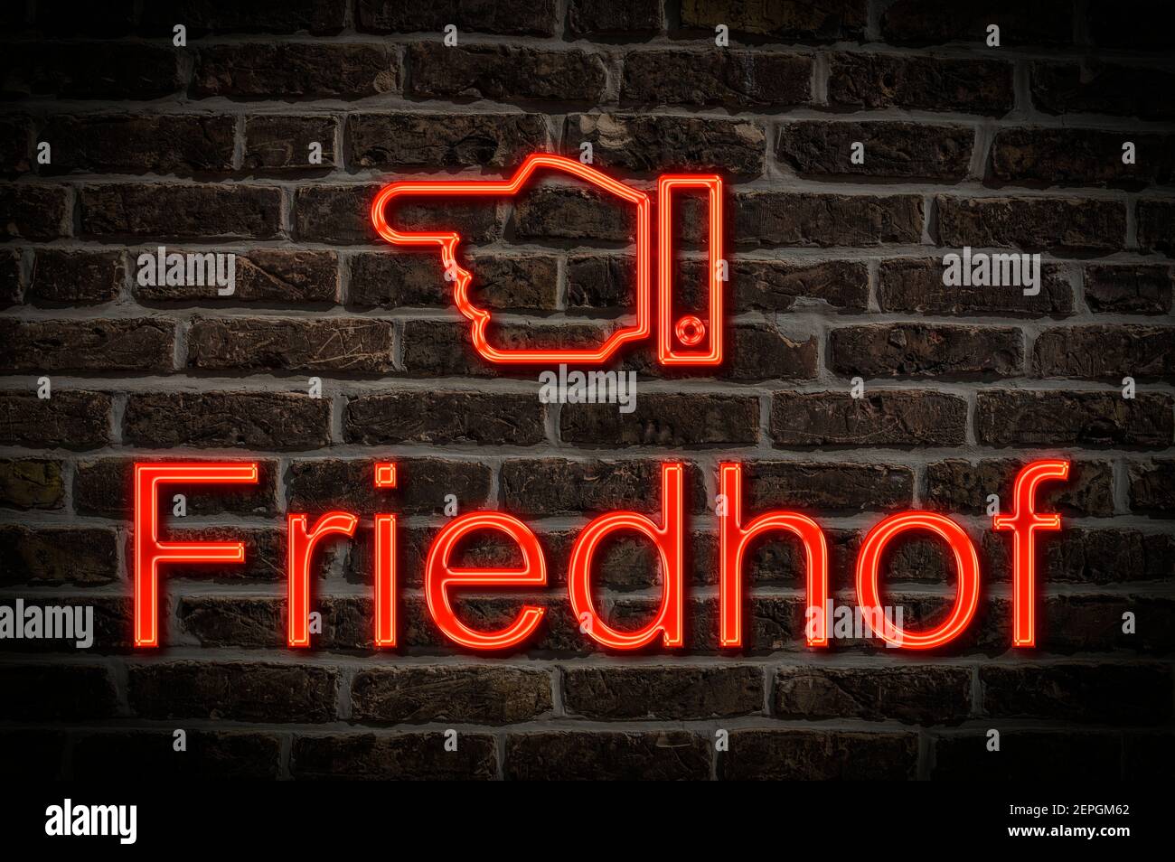 Detail photo of a a neon sign on a wall with the inscription Friedhof (Cemetery) Stock Photo