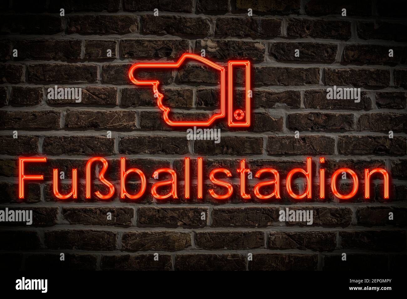 Detail photo of a a neon sign on a wall with the inscription Fußballstadion (Football stadium) Stock Photo