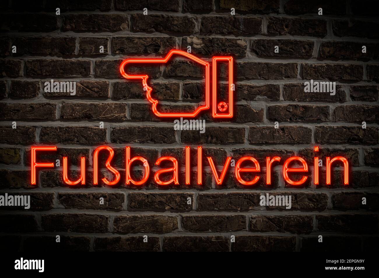 Detail photo of a a neon sign on a wall with the inscription Fußballverein (Football club) Stock Photo