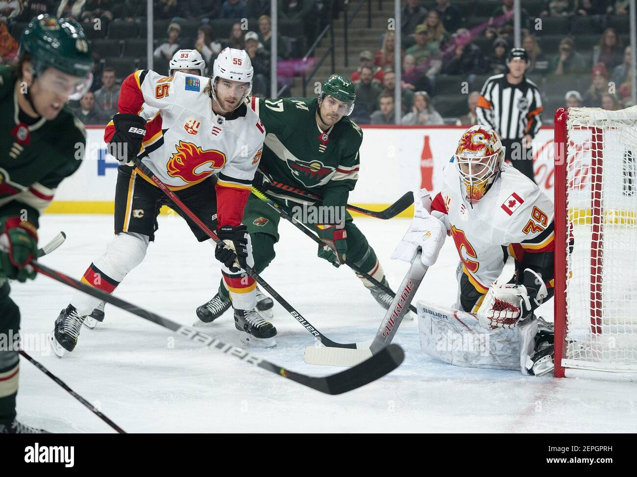 Minnesota Wild left wing Marcus Foligno (17) watches for a centering pass in front of Calgary Flames goaltender Cam Talbot (39) while defended by Flames defenseman Noah Hanifin (55) in the first period Monday, Dec. 23, 2019 at Xcel Energy Center in St. Paul, Minn. The Wild won 3-0. (Photo by Jeff Wheeler/Minneapolis Star Tribune/TNS/Sipa USA) Stock Photo