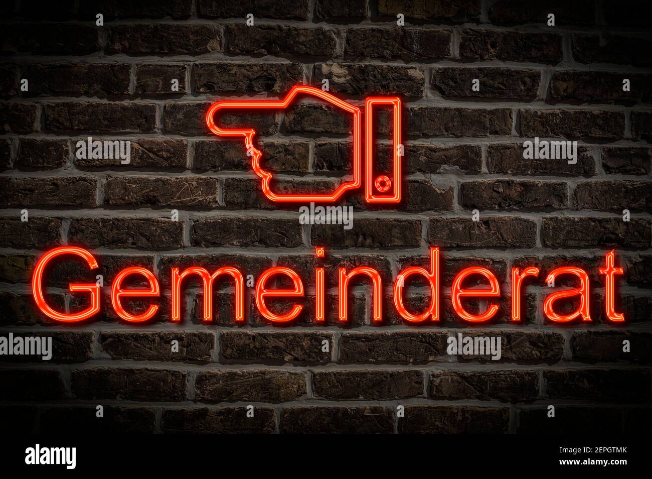 Detail photo of a a neon sign on a wall with the inscription Gemeinderat (Local council) Stock Photo