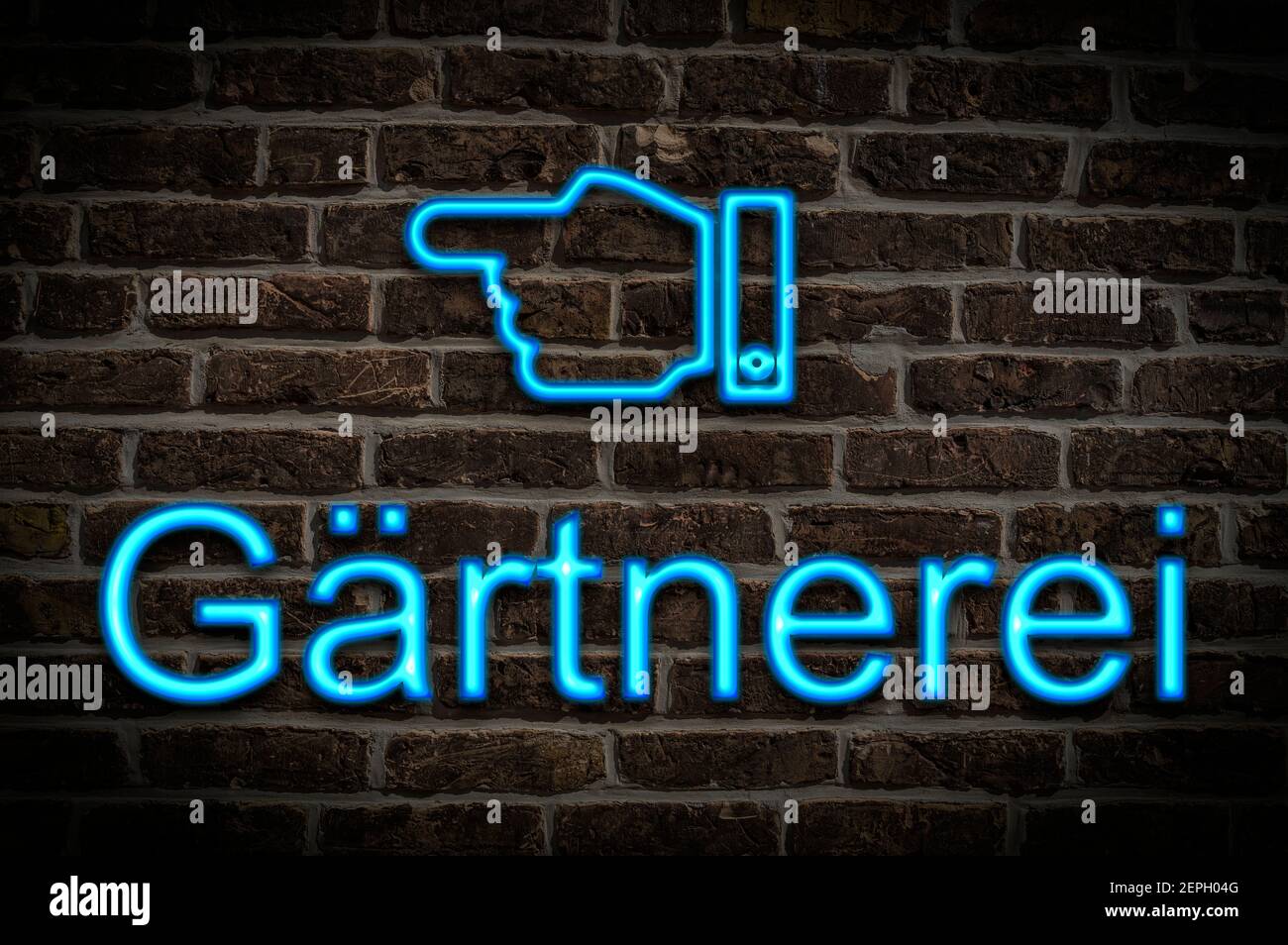 Detail photo of a a neon sign on a wall with the inscription Gärtnerei (Nursery) Stock Photo