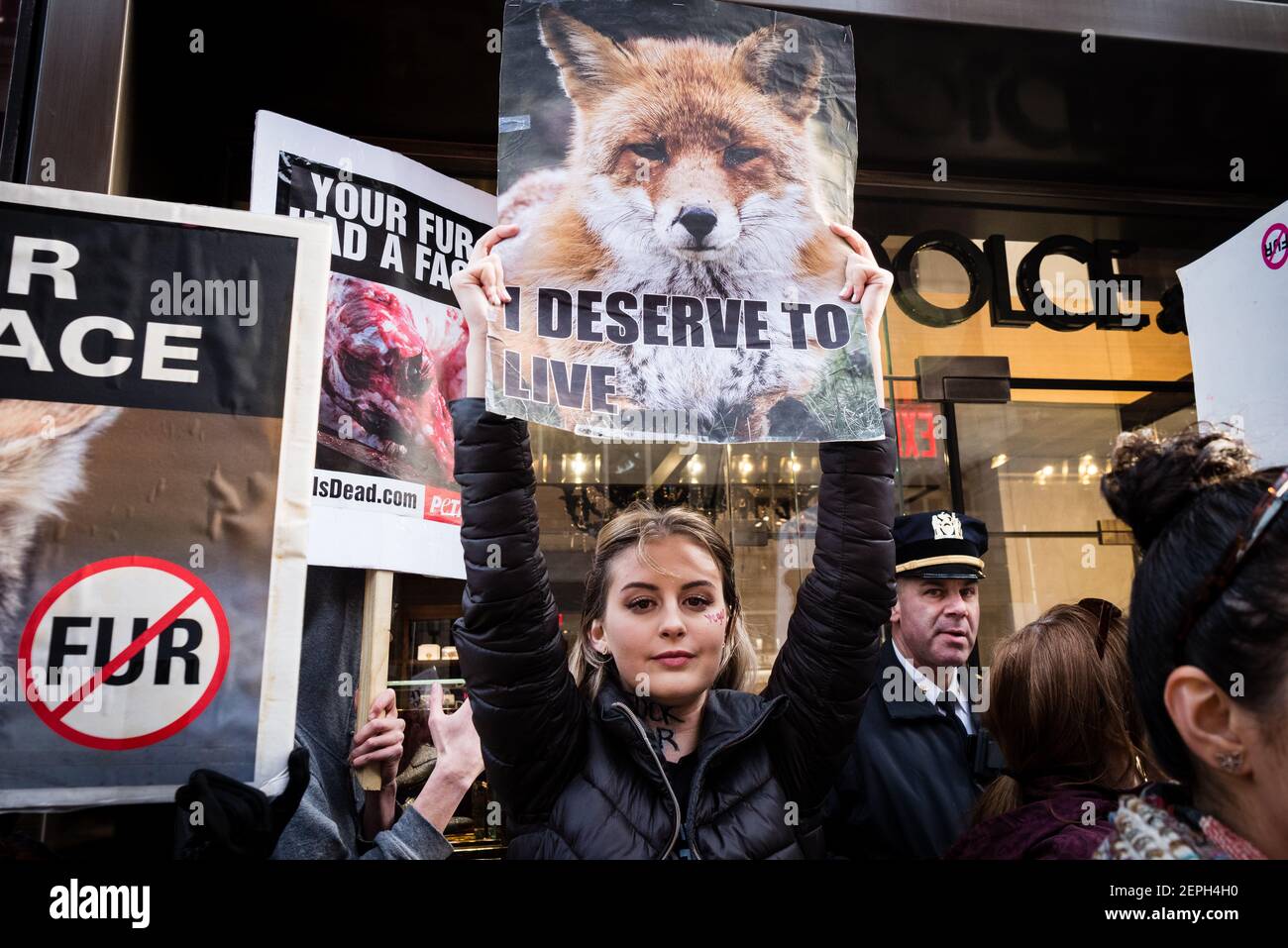 Animal rights activists protest the sale of fur outside Dolce & Gabbana ...