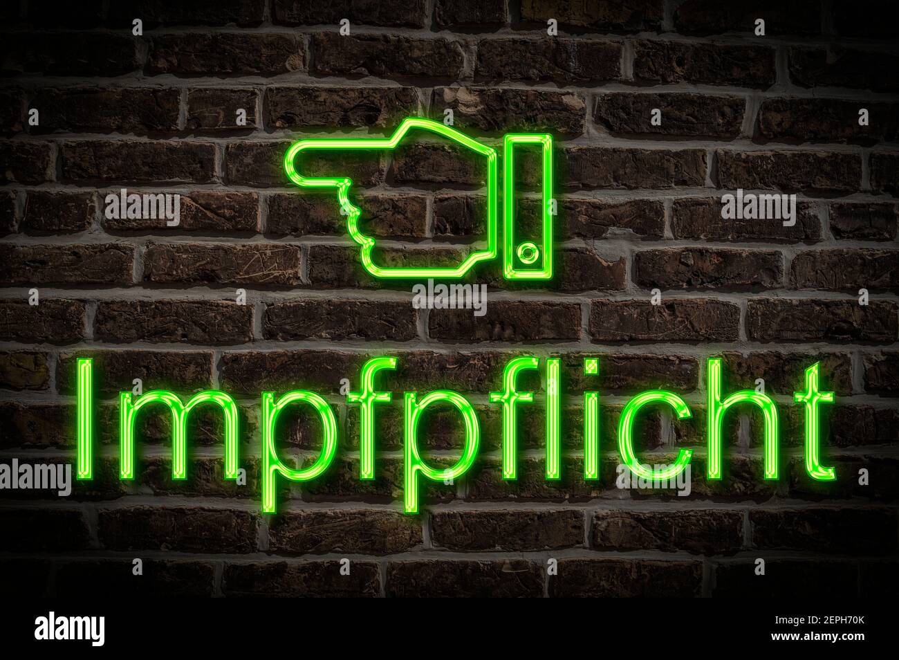 Detail photo of a a neon sign on a wall with the inscription Impfpflicht Stock Photo