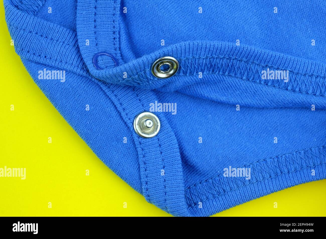 clothing items washed cotton fabric texture with seams, clasps, buttons and  rivets, macro, close-up Stock Photo - Alamy