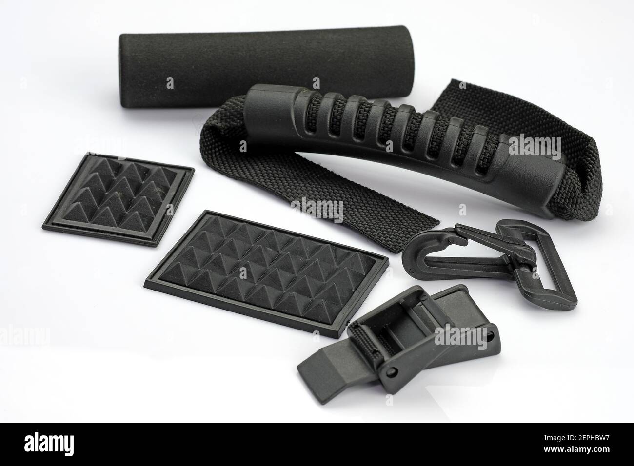 Spare parts for the repair of suitcases. Plastic black fittings for