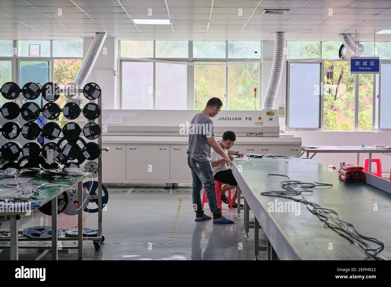 Workers manufacturing LED lights inside a LED factory in Shenzhen, China.An  analysis showed that China LED lighting market is going to cross the US$ 29  Billion mark by the year-end of 2025. LEDs provide numerous advantages over  traditional lighting ...