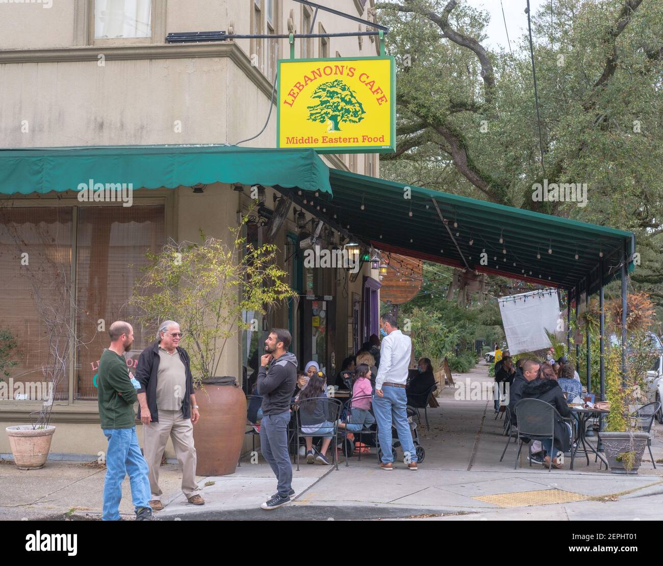 NEW ORLEANS, LA, USA - FEBRUARY 21, 2021: Lebanon's Cafe with customers dining and socializing outside Stock Photo