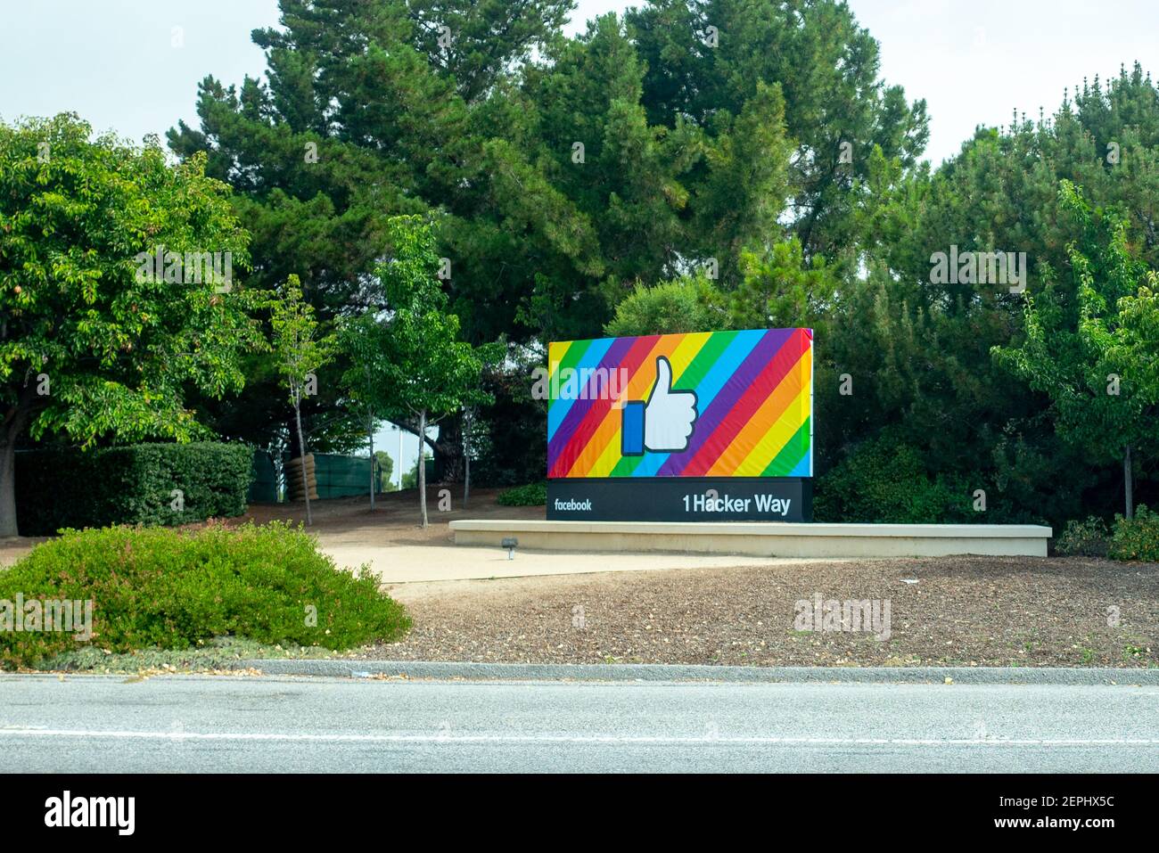 Sign with logo at entrance to headquarters of Facebook Inc at 1 Hacker ...