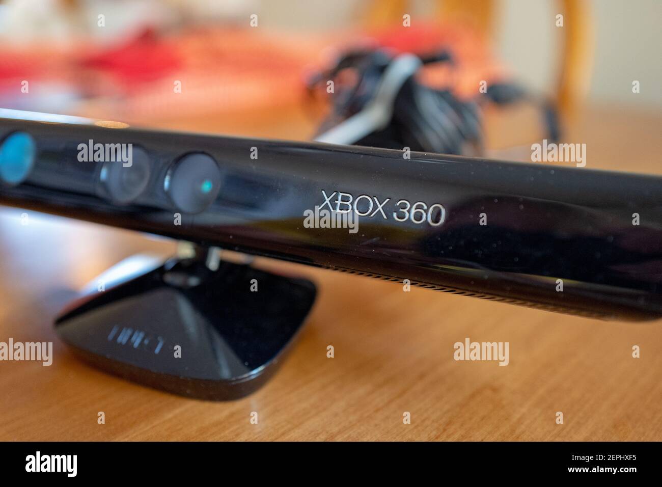 Close-up of first generation Xbox 360 Kinect motion sensing gaming  controller, a low-cost depth camera designed to allow gesture control of  Microsoft Xbox video game systems, ca 2010, in domestic room, August