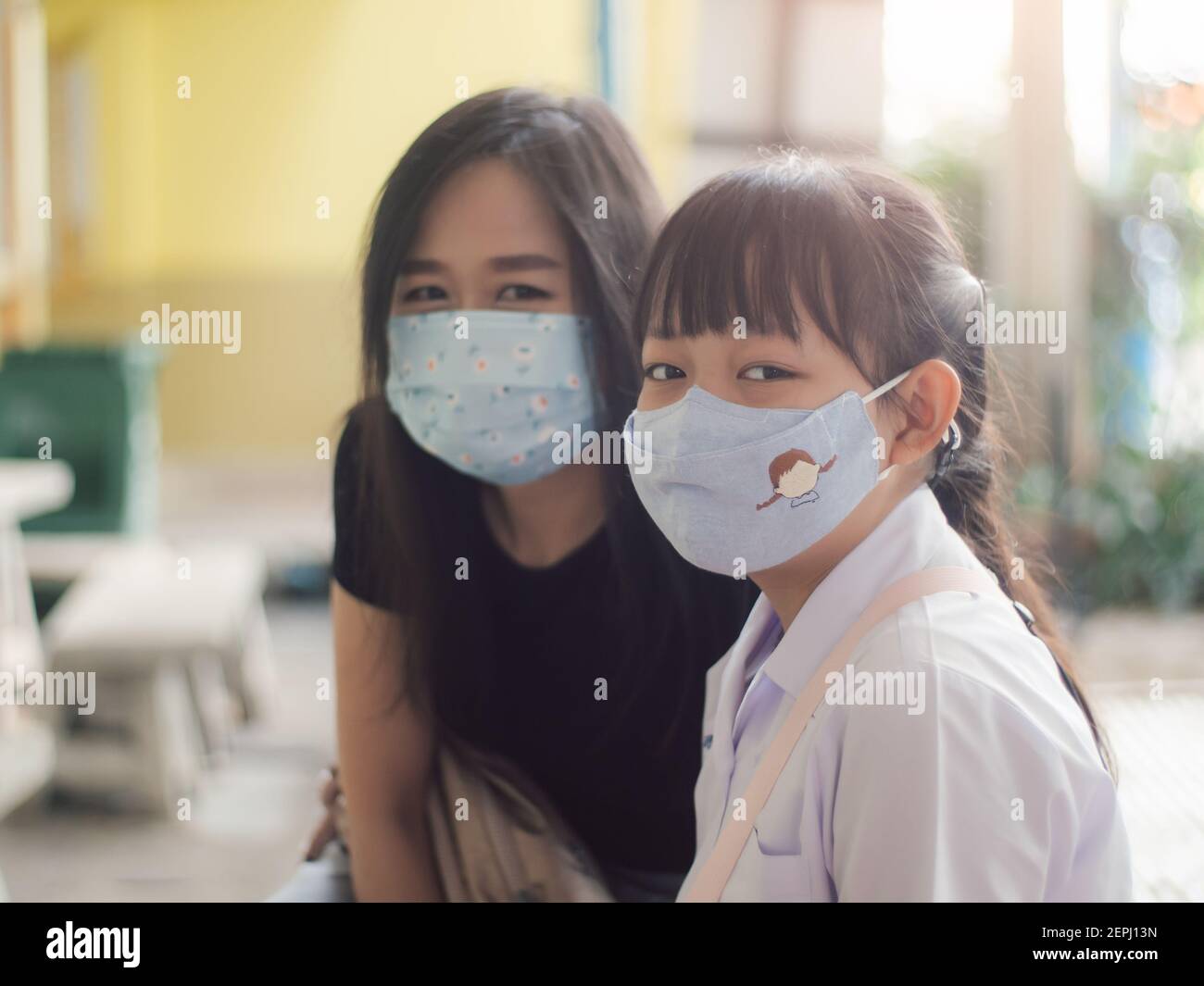 Asian child wearing face mask hi-res stock photography and images - Alamy