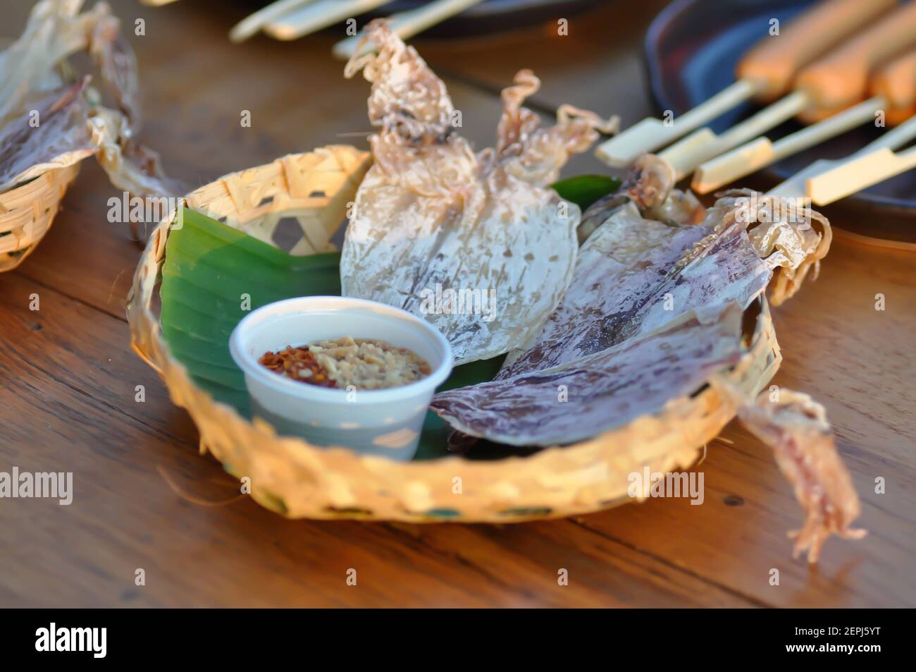 dried squid, grilled squid or squid and dip in Thai food Stock Photo