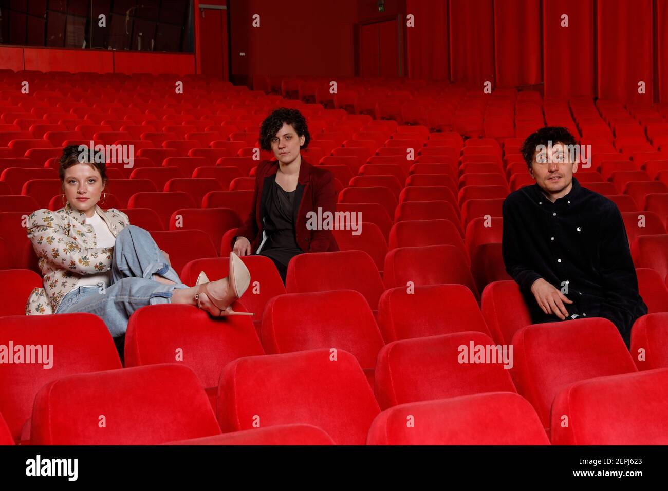 Berlin, Germany. 27th Feb, 2021. Jella Haase (l-r), Melanie Waelde and Mees Peijnenburg, the jury members of the Generation section of the 71st International Film Festival, show off in the empty cinema hall of the Berlinale Palast. The three-member jury will decide on the Grand Prize for Best Film in Competition Kplus (endowed with 7,500 euros, donated by the German Children's Fund) and the Grand Prize for Best Film in Competition 14plus (also endowed with 7,500 euros). The awards will be announced at the Industry Event on 5 March 2021. Credit: Markus Schreiber/AP POOL/dpa/Alamy Live News Stock Photo