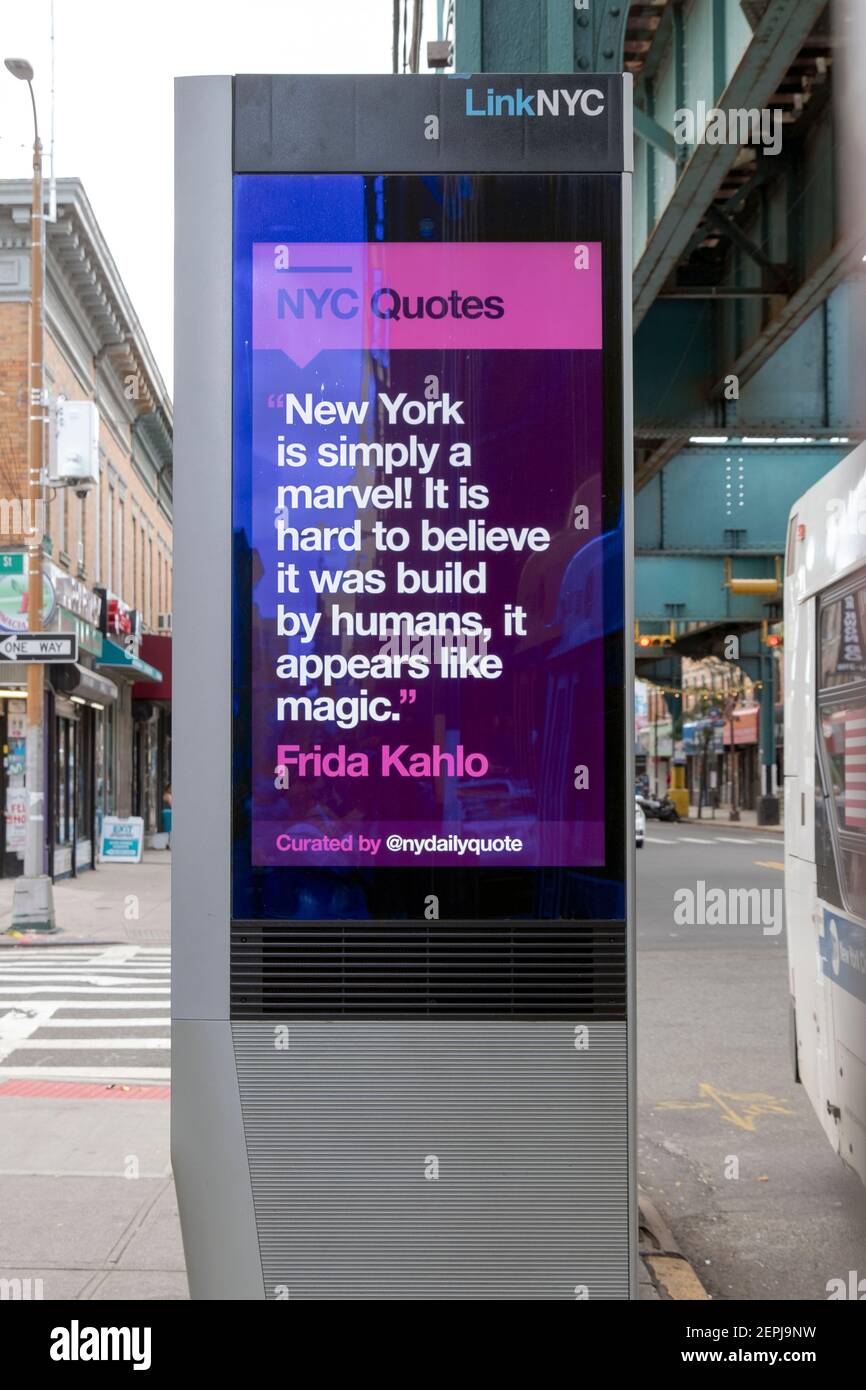 A Link NYC message screen with a quote from Agatha Christie about the magic of New York City. On Jamaica Ave. in Woodhaven, Queens, NYC Stock Photo