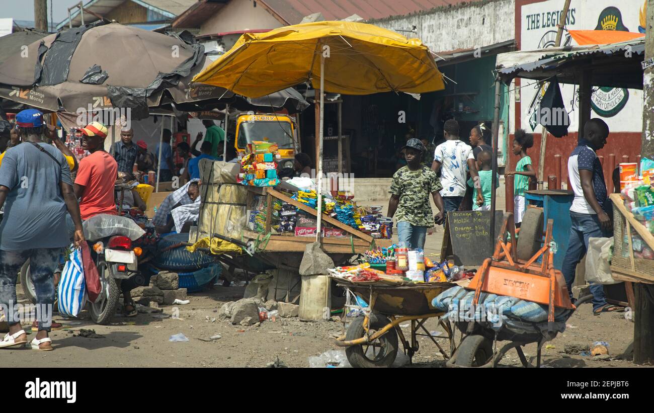 Monrovia Liberia city urban crowded busy street. History Civil wars, Ebola and COVID and economic failures has stagnated the nations economic growth. Poverty and lack of work and industry. Stock Photo