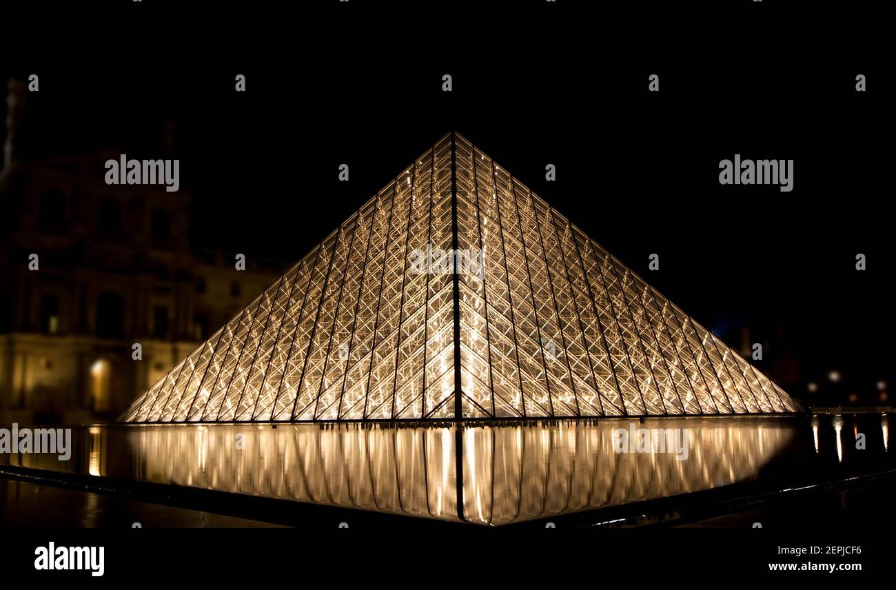 Louvre, Pyramid, which was completed in 1989 (by night), France Stock ...