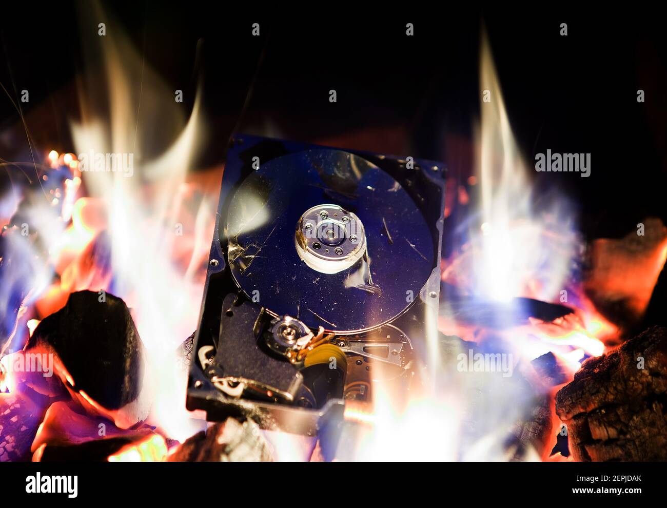 Crushed Hard Disk Drive in the Fire Stock Photo Alamy