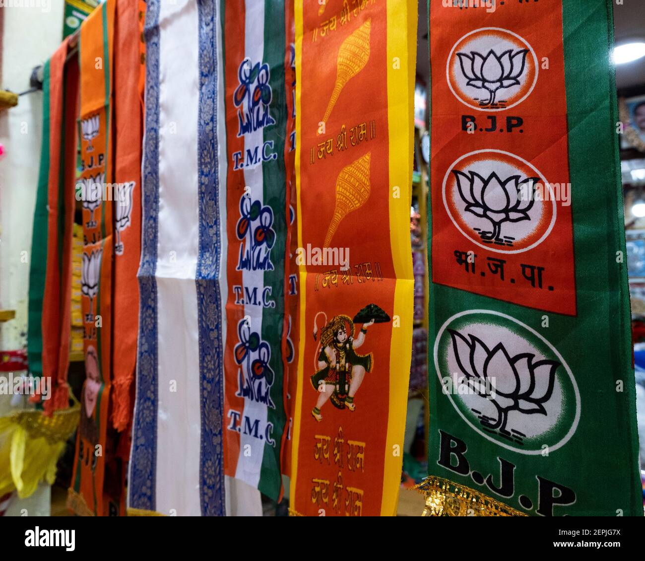 National flags seen displayed in a shopduring the election preparation. Various political campaign products, flags are on display for sale prior to the West Bengal legislative Assembly Election 2021. Stock Photo