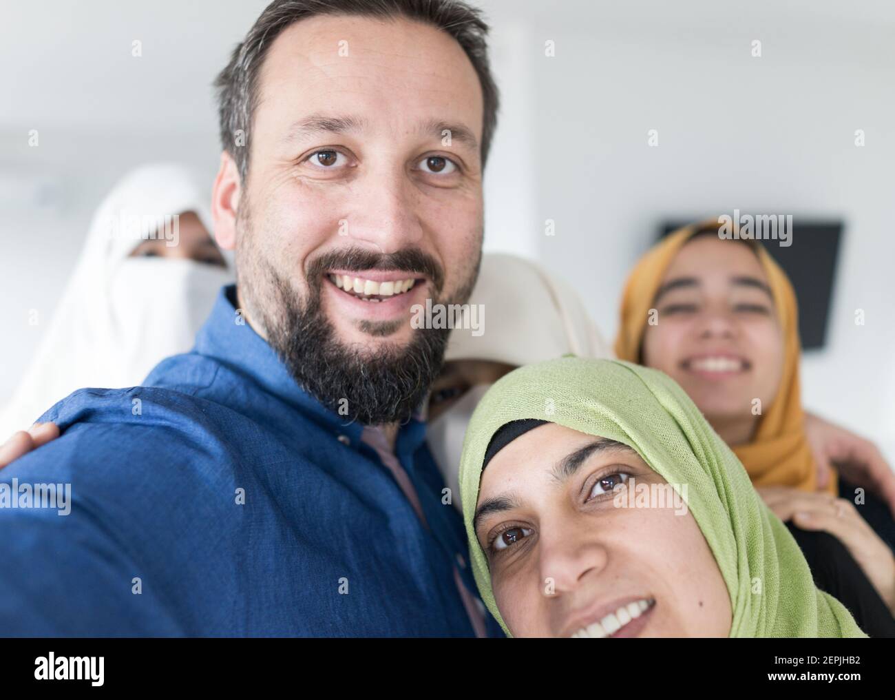 Muslim man with 4 wives portrait ,quality photo Stock Photo