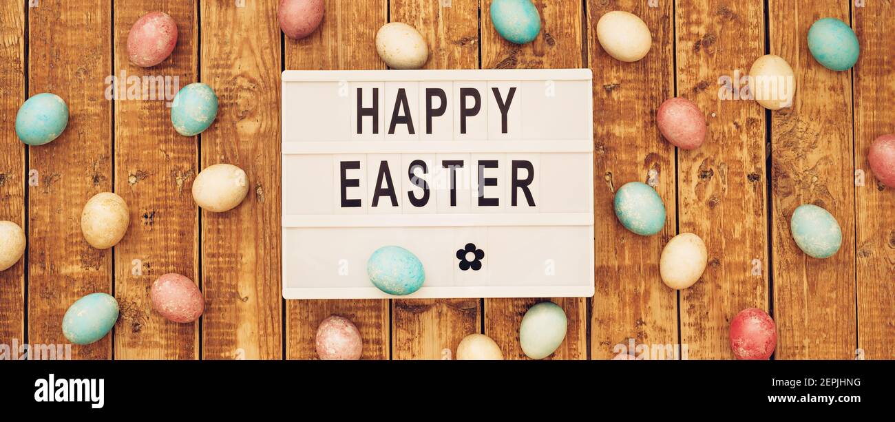 Greeting banner with Easter eggs and lightbox Stock Photo