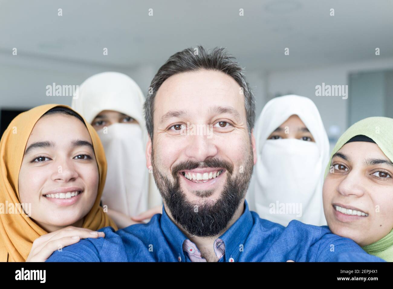 Muslim man with 4 wives portrait ,quality photo Stock Photo