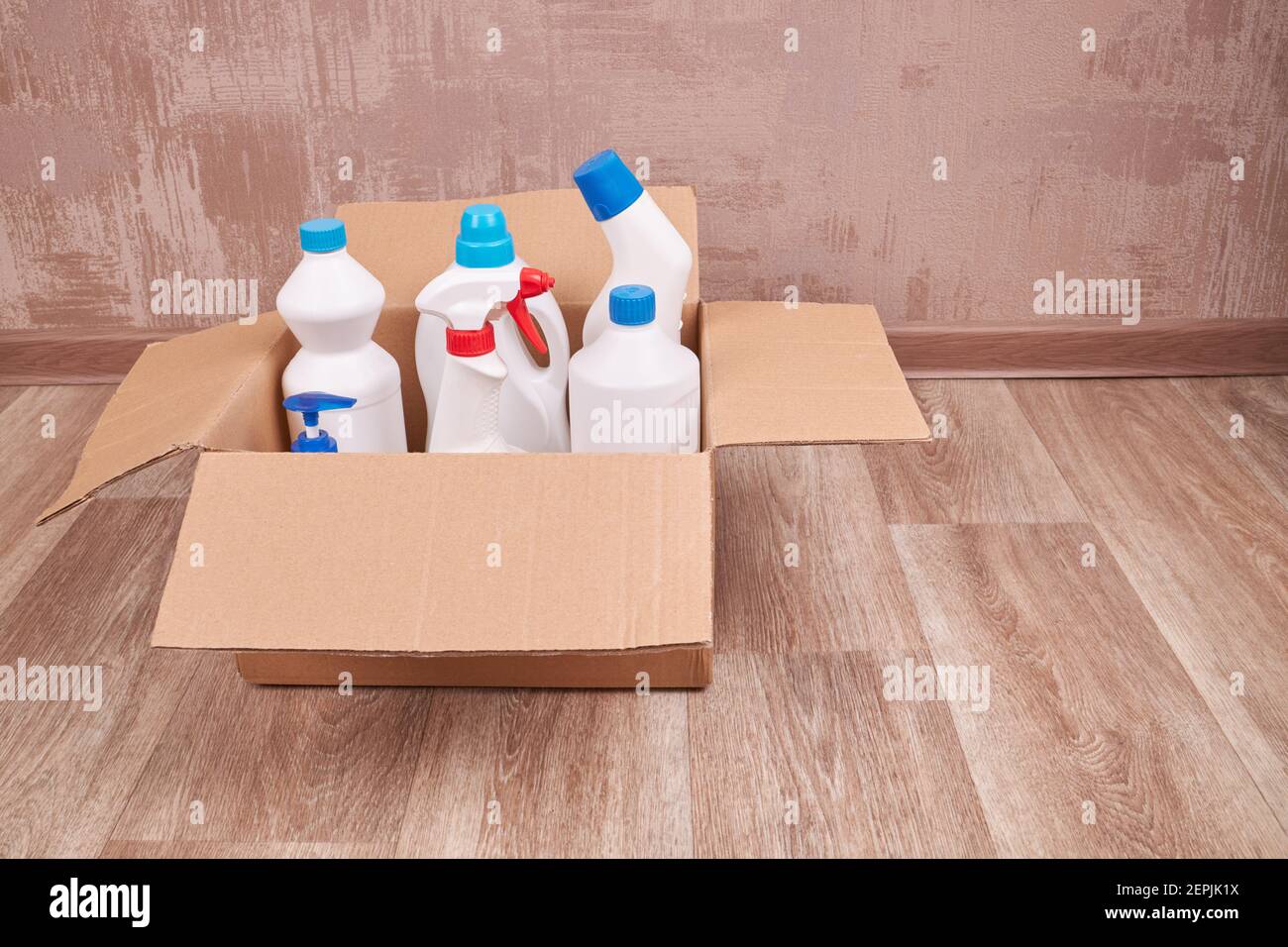 blank cleaning chemicals bottles for housework. product delivery and wash up service concept Stock Photo