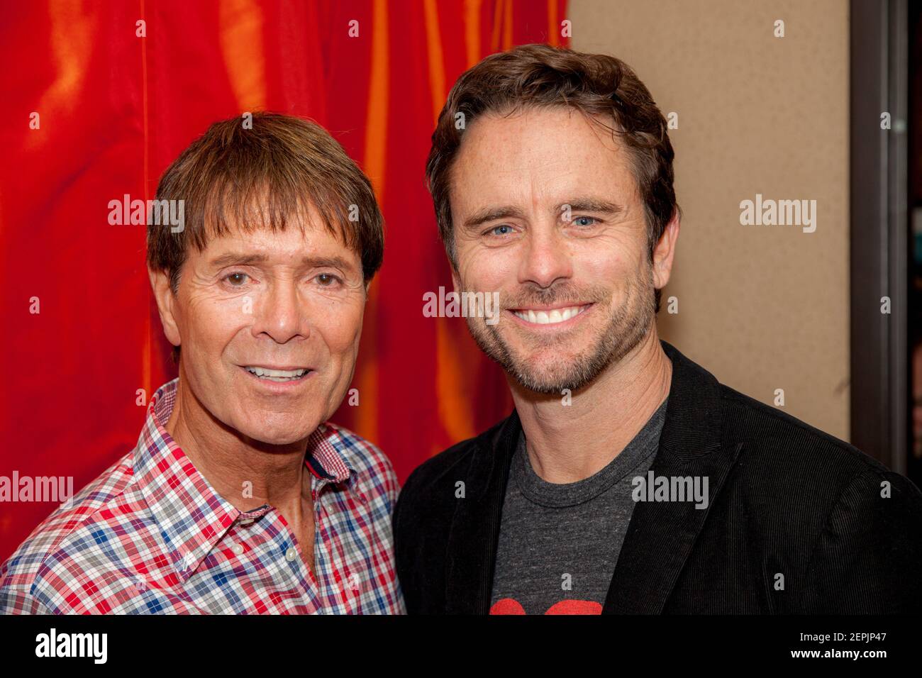 English pop star Sir Cliff Richard with American actor Charles Esten backstage at the Grand Ole Opry, Nashville, Tennessee, USA Stock Photo